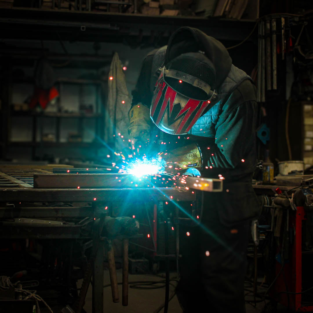 Chunk Monkey founder, owner and fabricator Dan Faull welding steel in the Swansea workshop