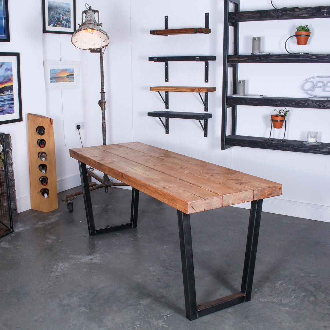 Farmhouse stained Extremely Chunky 3 board solid wood dining table featuring 'Chunk One' legs in rustic industrial room
