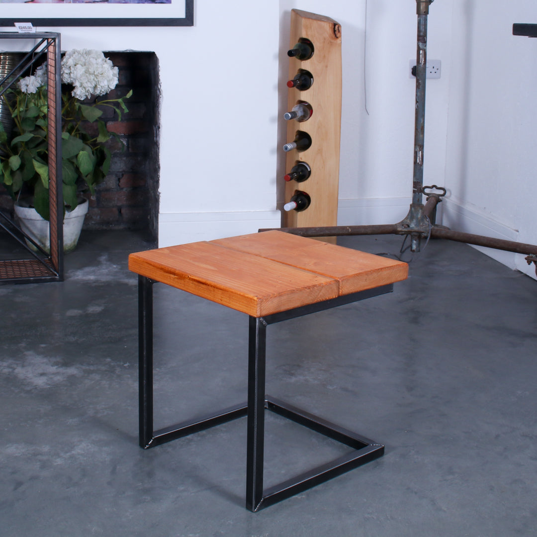 Rustic industrial stool with footrest and Extra Chunky light oak seat on a low cantilever frame