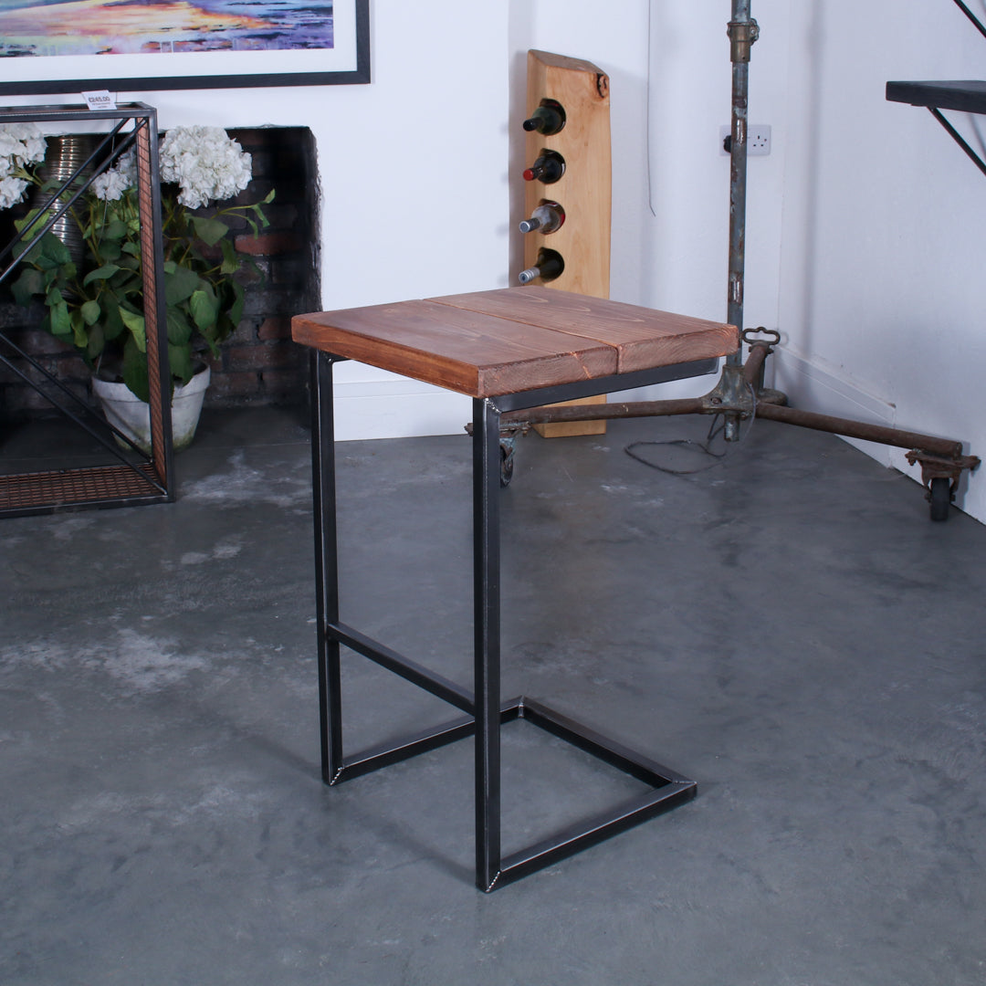 Rustic industrial stool with footrest and Extra Chunky light walnut seat on a high cantilever frame