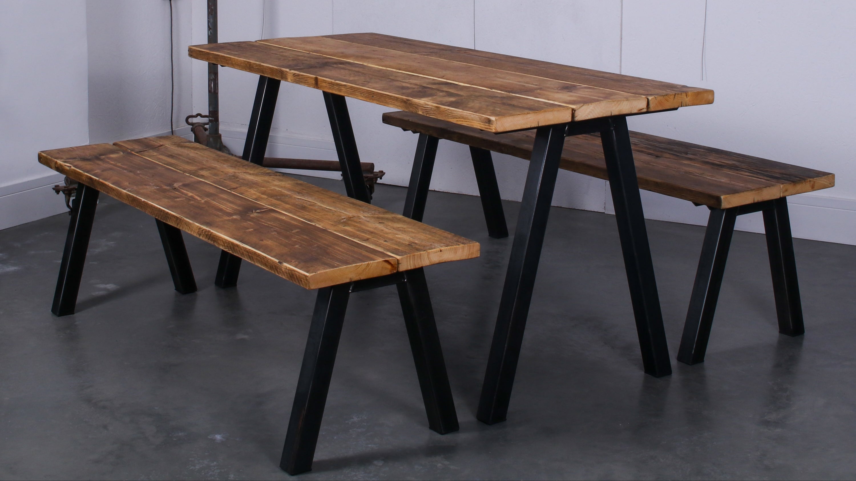 Handmade rustic industrial reclaimed scaffold board dining table and benches with our signature Chunk Two steel legs