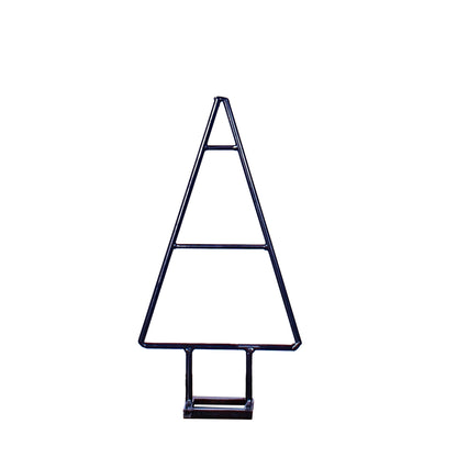 Rustic industrial small steel Christmas tree in a studio setting.