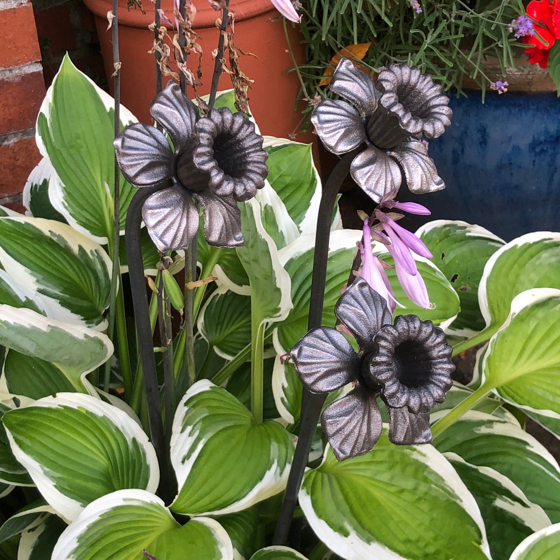 trio of ornamental metal daffodils  